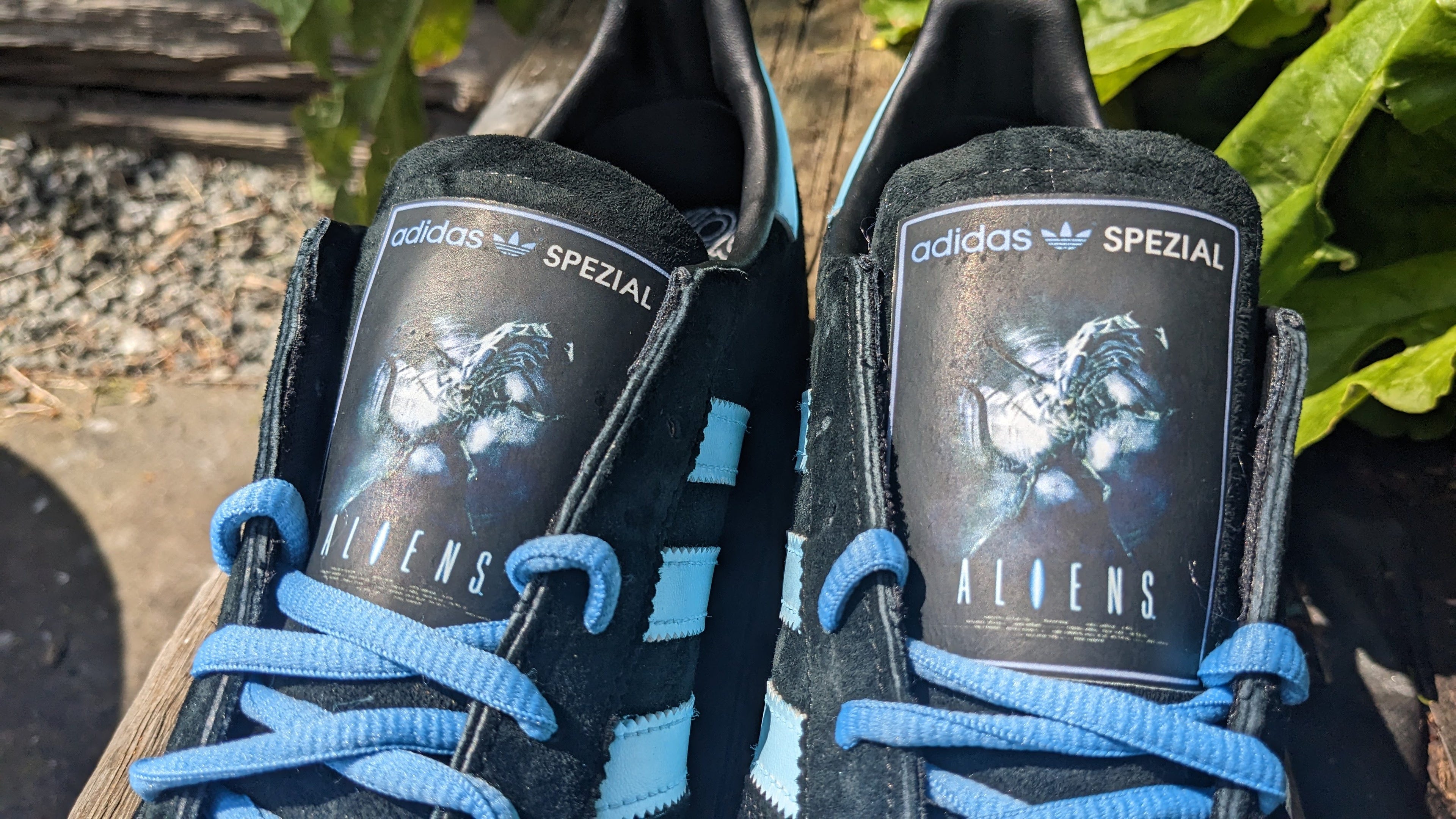 Limited edition Ridley Scotts Aliens inspired black / light blue Adidas Handball Spezial trainers / sneakers