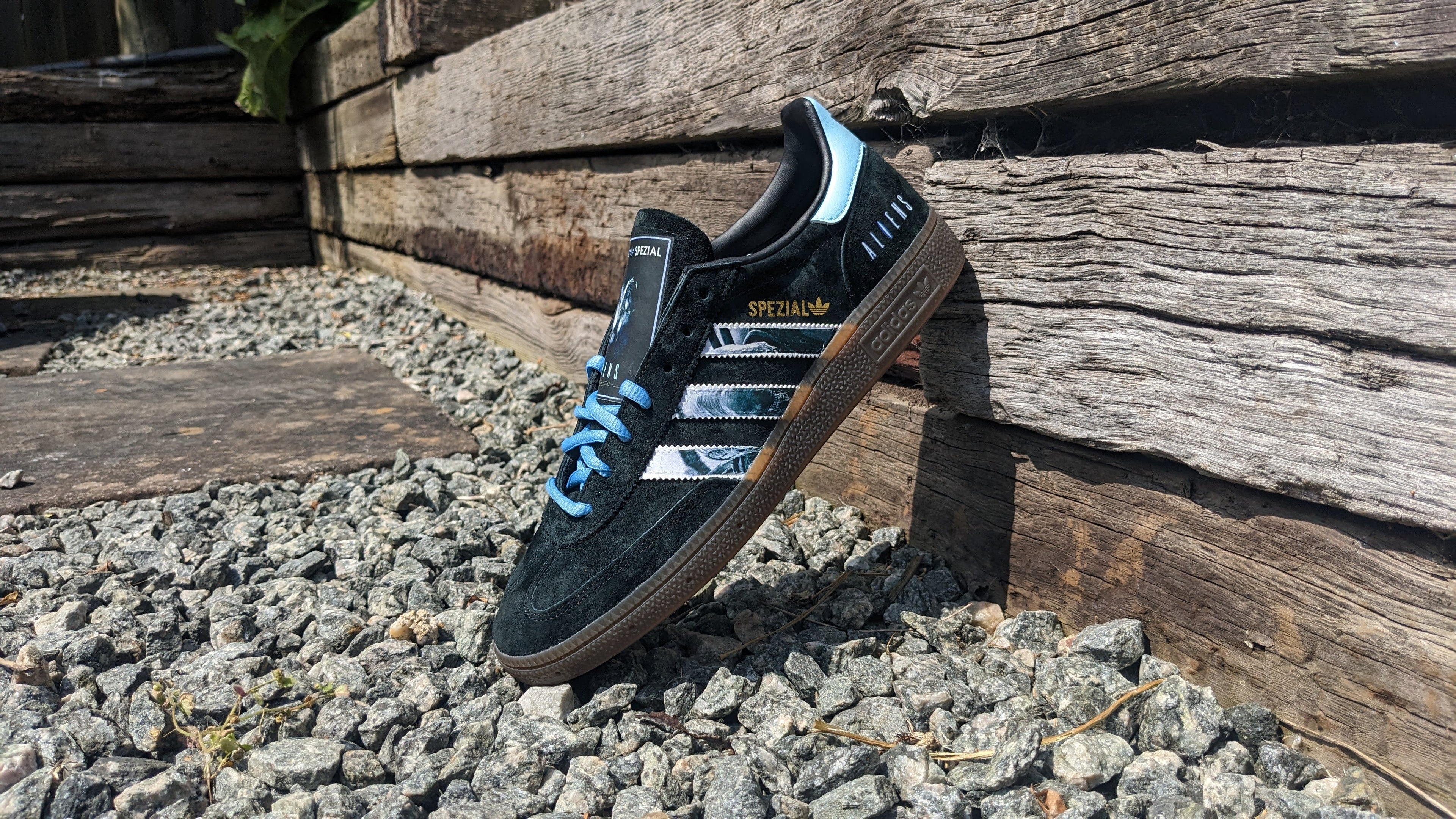 Limited edition Ridley Scotts Aliens inspired black / light blue Adidas Handball Spezial trainers / sneakers