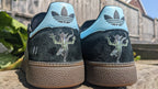 Limited edition Ridley Scotts Aliens inspired black / light blue Adidas Handball Spezial trainers / sneakers