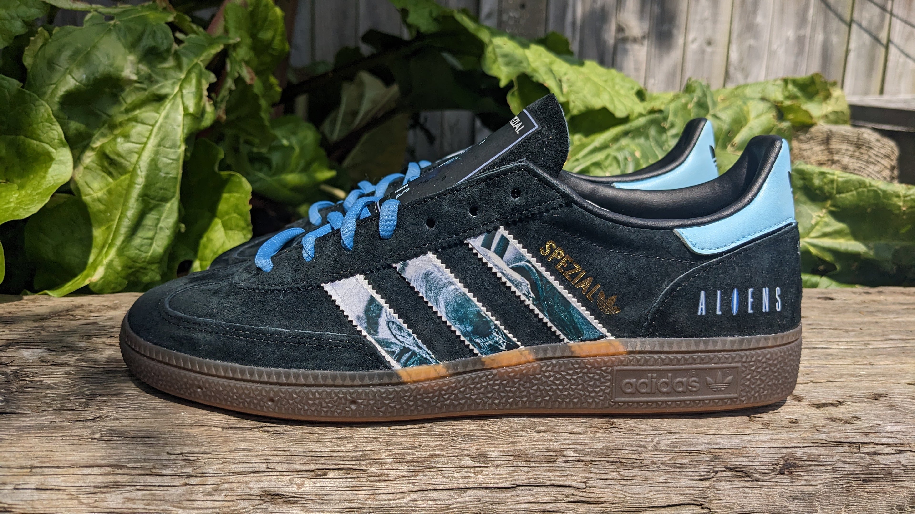 Limited edition Ridley Scotts Aliens inspired black / light blue Adidas Handball Spezial trainers / sneakers