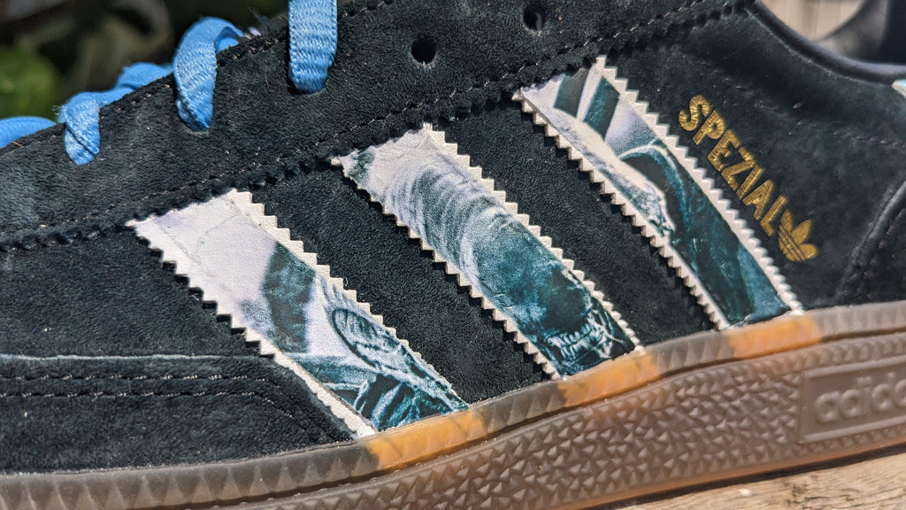 Limited edition Ridley Scotts Aliens inspired black / light blue Adidas Handball Spezial trainers / sneakers