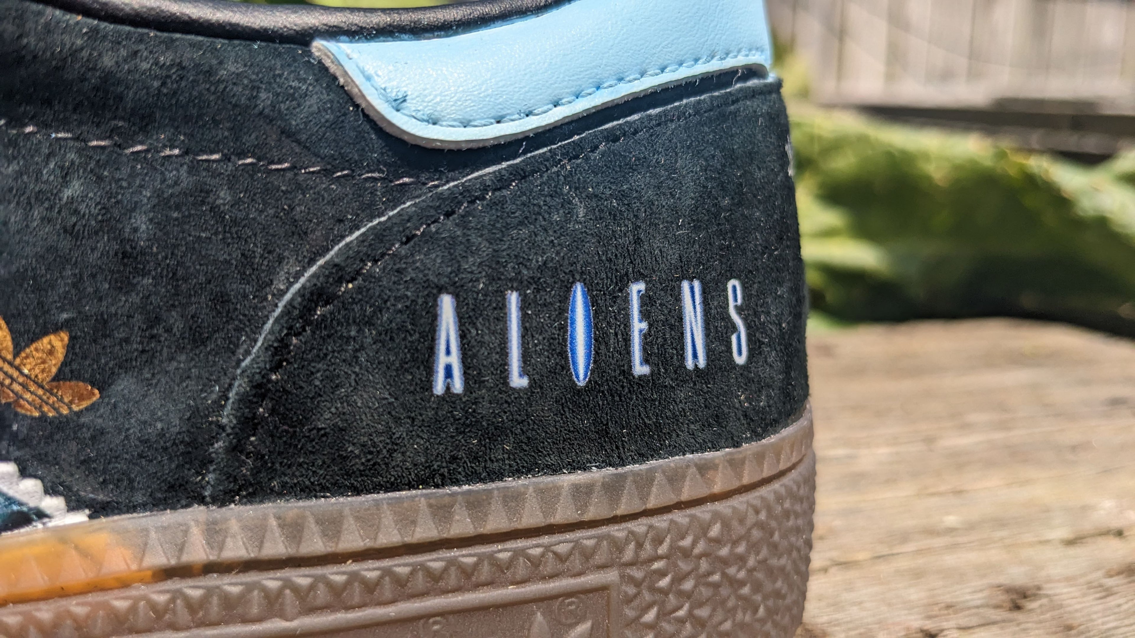 Limited edition Ridley Scotts Aliens inspired black / light blue Adidas Handball Spezial trainers / sneakers
