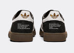 Limited edition The Streets Original Pirate Material inspired black / white  Adidas custom Handball Spezial trainers / sneakers