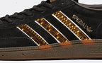 Limited edition The Streets Original Pirate Material inspired black / white  Adidas custom Handball Spezial trainers / sneakers