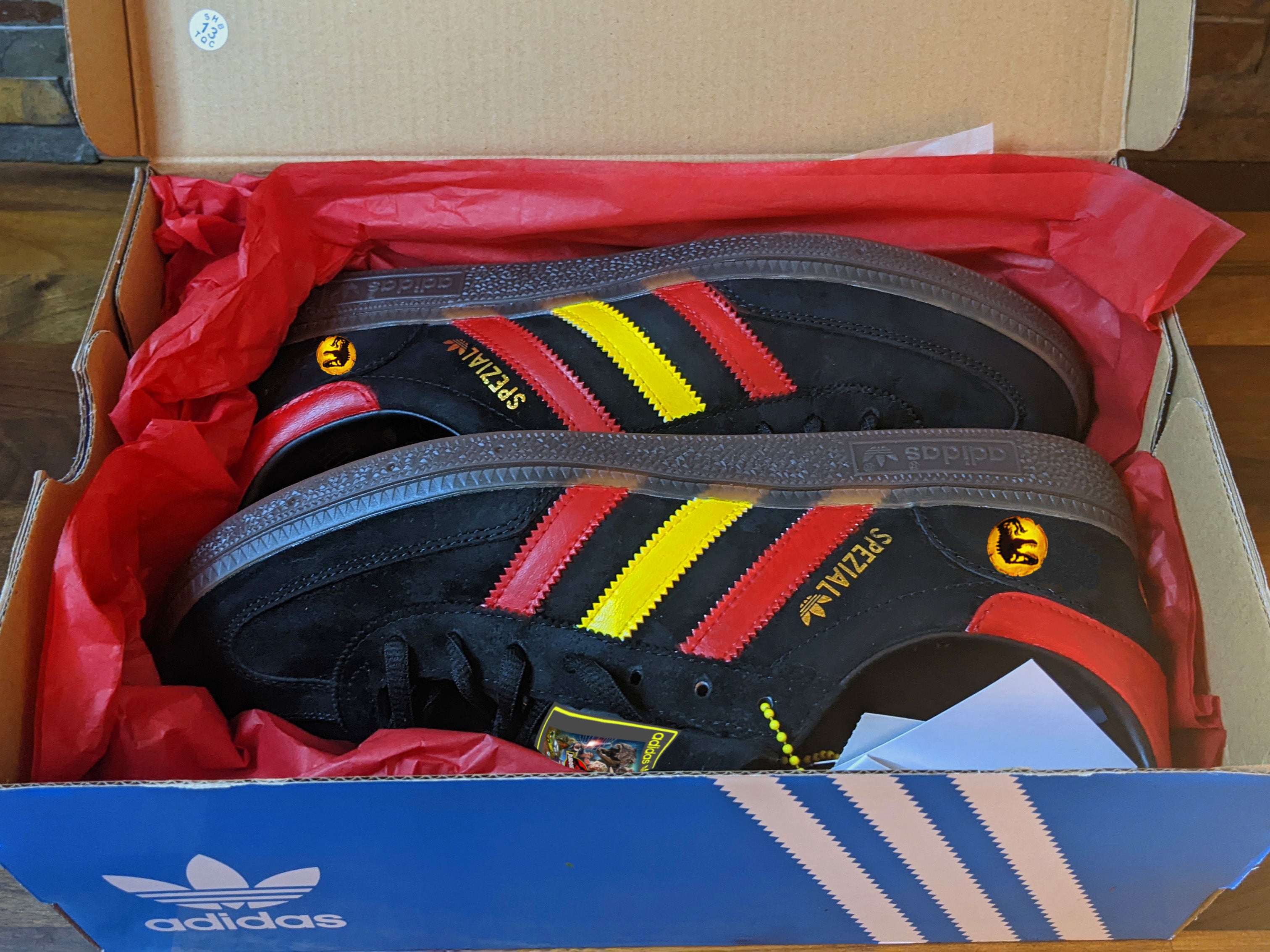 Limited edition Jurassic Park inspired black / red/ yellow Adidas custom Handball Spezial trainers / sneakers