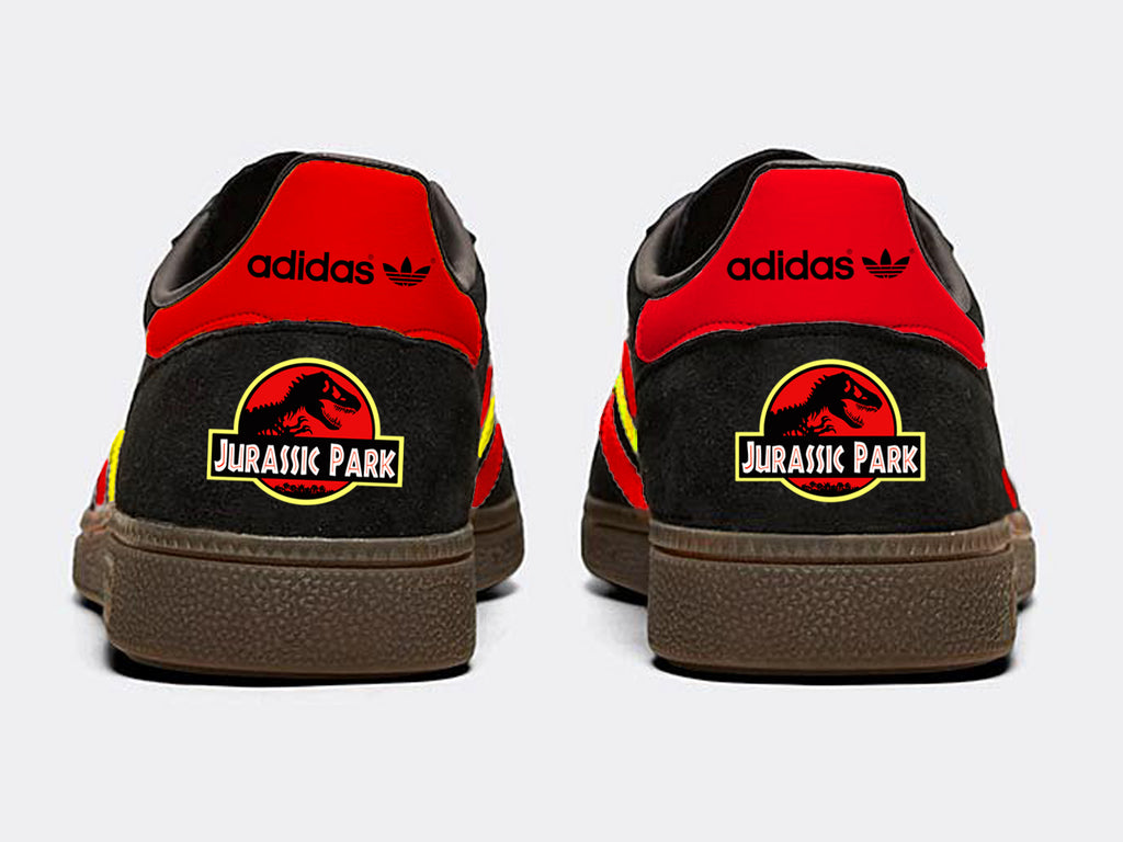 Limited edition Jurassic Park inspired black / red/ yellow Adidas custom Handball Spezial trainers / sneakers